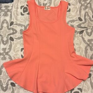 Peplum Blouse. The color is like a peach.